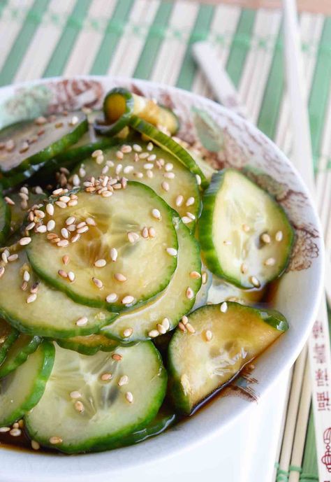 This Cucumber Salad Recipe is a quick, easy side dish that is perfect for summer! Thinly sliced cucumbers in a soy sauce sesame seed dressing. A cool vegan cucumber salad with Asian flair! Pickle Cucumbers, Malaysia Recipes, Pickled Cucumber, Refreshing Snacks, Refrigerator Pickles, Rasa Malaysia, Table For Two, Cucumber Recipes Salad, Cucumber Recipes