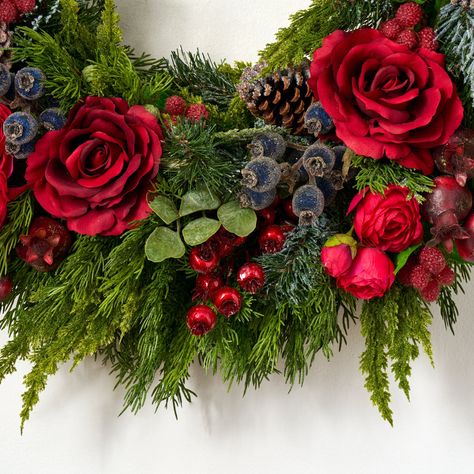 Available in: 26" Diameter x 6" Deep 30" Diameter x 6" Deep Lifelike Floral & Botanical Indoor or Outdoor Covered Use Designed, Handcrafted in Ohio Shown in Size 26" Wreath Only; Garland and Accessories Sold Separately Coordinating Collection: Arrangement: AR1565 Garland: GAR1109 The Holiday Season is a splendid time of year to spruce up your home with a beautiful wreath. Our Red Queen Rose & Mixed Winter Berry Classic Holiday Front Door Mantle Wreath is the perfect statement piece for the front Red Rose Christmas Wreath, Mantle Wreath, Holiday Front Door, Fall Tabletop Decor, Halloween Stem, Christmas Stem, Rosé Christmas, Winter Berry, Heart Shaped Valentines