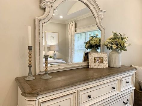 White Washed Bedroom Furniture Ideas, Dresser Decor Neutral, Neutral Paint Bedroom Ideas, Magnolia Manor Bedroom Set, French Bedroom Decor Ideas, French Country Dresser Decor, Realyn Bedroom Set Decor, White Drapes Bedroom, Farmhouse Bedroom Dresser Decor