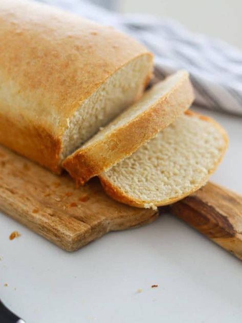 Jamaican Hard Dough (Hardo) Bread isn't your average white loaf it has a soft yet firm thick crust with a tender, chewy inside enriched by milk, butter and sugar, for a hint of sweetness. This Jamaican twist on simple white bread is used to make sandwiches or simply paired with a slice of cheese or spread of butter or jam. The options for this bread are endless! Best Whole Wheat Bread, Cultural Recipes, Homemade Whole Wheat Bread, Peasant Bread, Farmhouse Bread, Honey Wheat Bread, Quick Baking, Chewy Bread, Wheat Bread Recipe