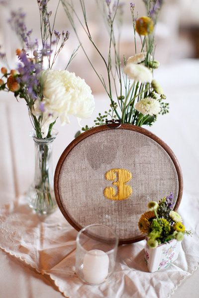 cute table number idea Wedding Table Numbers Vintage, Vintage Wedding Table Settings, Vintage Table Numbers, Wedding Favor Table, Vintage Wedding Table, Wedding Embroidery, Woods Photography, Table Styling, Maine Wedding