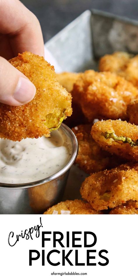 This easy Fried Pickles recipe features juicy dill pickle slices dipped in a perfectly seasoned batter and fried to crispy perfection. Enjoy this favorite fair food at home, any time you want, dunked in some creamy ranch dressing! #fairfood #easyappetizers #appetizerrecipes Fry Pickles Recipes, How To Make Deep Fried Pickles, Diy Fried Pickles, Fried Pickles Videos, Fries Pickles Recipe, Southern Fried Pickles, Fried Pickles Stove Top, Easy Deep Fried Recipes, Fried Pickles Air Fryer Recipes