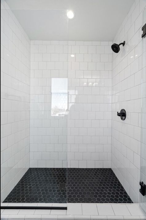 White Shower With Black Floor, Shower With Black Floor, White Tile White Grout, Large Subway Tile Shower White, Shower White Tile, Tile Shower White, Large Subway Tile, Walk In Bathroom Showers, Black Fixtures