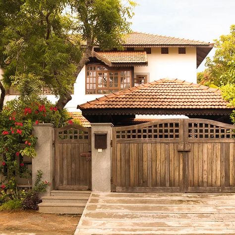 Chitra Rajan Residence | Benny Kuriakose Benny Kuriakose, Tamil House, Kerala Architecture, Sloping Roof, Indochine Style, Front Verandah, Yellow Cabinets, Kerala House, Bungalow Exterior