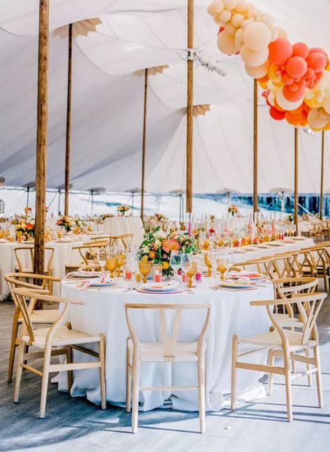 Want your wedding to pop without it being too much? Add neon pinks and bright oranges with stark white tablecloths and wooden wishbone chairs. The look is playful, inviting, and perfect for a summer wedding. See more stunning round table wedding décor ideas at the link. // Photo: Meg Smith Photography Round Table Wedding, Round Table Centerpieces Wedding, Bright Wedding Decorations, Round Table Settings, Round Table Centerpieces, Round Wedding Tables, White Round Tables, Round Table Decor, Tall Wedding Centerpieces