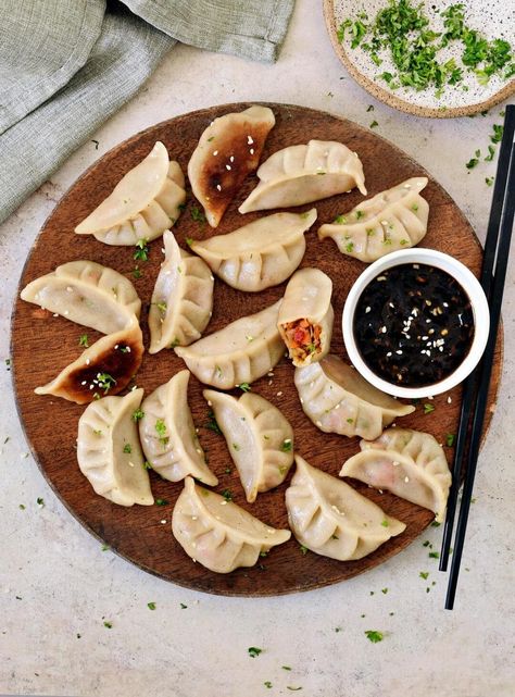 How to make dumpling wrappers at home (regular or gluten-free) using under 5 ingredients and a simple process. This dumpling dough is perfect for using to make potstickers, dumplings, gyoza, wontons, and several non-dumpling-related uses! #dumplingwrapper #glutenfreedumplings #asianwrappers #wontonwrappers #wontons #gyoza #potstickers | elavegan.com Vegan Dumplings Recipe, Vegetarian Dumplings Recipe, Gluten Free Dumpling Wrappers, Seafood Dumplings, Gluten Free Dumplings, Vegetarian Dumpling, Vegan Dumplings, Vegetable Dumplings, Pizza Roll