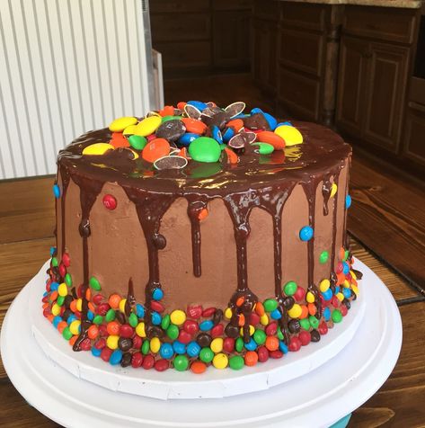 Mm Cake Ideas, M Ms Cake, M And M Cake Birthday, M M Cake Ideas, Candy Decorated Cake, M And M Cake, Cake Drip, M&m Cake, Chocolate Cake Designs