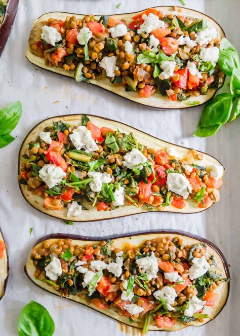 Lentil stuffed eggplant is a hearty meatless meal filled with brown lentils, tomatoes, onions and greens. Top with goat cheese for a creamy bite or leave off for a vegan version. Stuffed Eggplant Recipes, Vegetarian Eggplant Recipes, Lentil Vegetable Soup, Stuffed Eggplant, Meatless Meal, Eggplant Recipe, Brown Lentils, Superfood Recipes, Lentil Stew