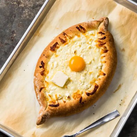 Adjaruli Khachapuri - loved this! Adjaruli Khachapuri, Savory Bakes, Bread Boats, Cooks Country Recipes, Donut Toppings, Georgian Food, Cooks Country, Pizza Stromboli, Cookie Toppings