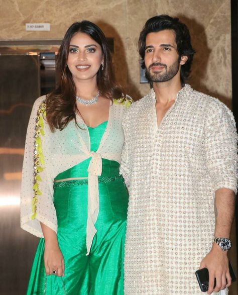 Aditya Seal and Anushka Ranjan have been dating each other for 4 long years. The duo had met each other at an event hosted by Anushka's family almost three and a half years ago, where they had instantly felt a strong connection. This is how their romantic love story had started. Both Aditya and Anushka have been very open about their relationship, and often share cutesy pictures with each other on their respective social media handles.     Bollywood actor, Aditya Seal and his girlfriend, Anushka Ranjan, Aditya Seal, Romantic Love Story, Bride Looks, Romantic Love Stories, Saree Gown, Engagement Ceremony, Looking Dapper, The Duo