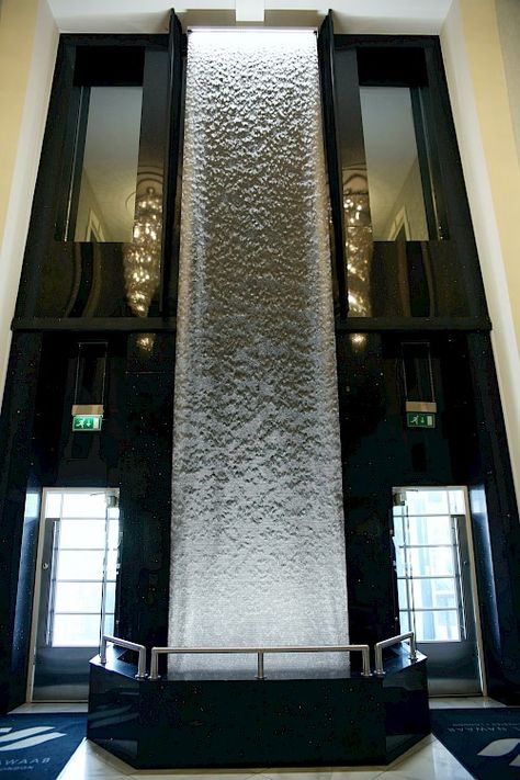 Interior Fountain Indoor Waterfall, Wall Mounted Water Feature, Fountain Hotel, Corner Bathroom Sink, Waterfall Designs, Indoor Waterfall Wall, Waterfall Decoration, Indoor Wall Fountains, Outdoor Wall Fountains