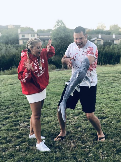 Halloween Shark Victim Lifeguard Couples Costume Shark And Victim Costume, Shark And Lifeguard Costume Couple, Lifeguard And Shark Costume, Shark Victim Costume, Diy Lifeguard Costume, Shark Bite Costume, Lifeguard Halloween, Halloween Shark, Lifeguard Costume