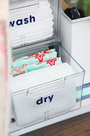 17 Brilliant Under the Sink Storage Ideas You Can't Afford to Miss | Of Life + Lisa Dish Towel Storage, Under The Kitchen Sink Organization, Kitchen Towels Storage, Kitchen Sink Remodel, Under The Sink Storage, Under The Kitchen Sink, Sink Cleaning, Under Kitchen Sink, Sink Organization