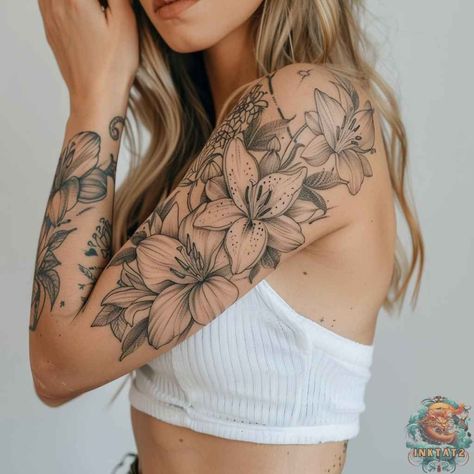 From Fragile Beauty to Powerful Symbol: The Fascinating History of Lily Tattoos: 114 Designs - inktat2.com Flower Piece Tattoo Arm, Script Sleeve Tattoo, Waterlily Sleeve Tattoos, Water Lily Arm Tattoo, Lilly Sleeve Tattoos For Women, Lilly Sleeve Tattoo, Upper Arm Shoulder Tattoos For Women, Tiger Lilies Tattoo, Water Lily Tattoo Sleeve