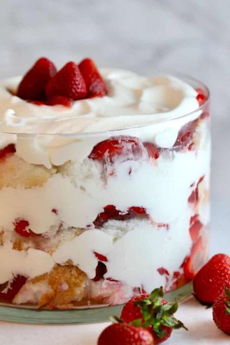 My easy no-bake, Strawberry Trifle with Angel Food Cake is made with fresh, luscious strawberries, heavenly whipped cream, and layers of light-as-a-cloud angel food cake. I guarantee that this make-ahead wonder will be one of the easiest and most delicious desserts you will ever prepare! #trifle #cream #strawberries #summer #dessert #angel #cake Trifle With Angel Food Cake, Strawberry Angel Food Cake Dessert, Strawberry Angel Food Cake, Strawberries Cake, Strawberry Trifle, Trifle Dish, Trifle Desserts, Trifle Recipe, Savory Cakes