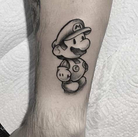 Mario Small Tattoo, Super Mario Bro Tattoo, Cute Mario Tattoo, Super Mario Tattoo Ideas Black And White, Supermario Tattoos, Mario Tatoos, Paper Mario Tattoo, Super Mario Tattoo Design, Mario And Luigi Tattoo