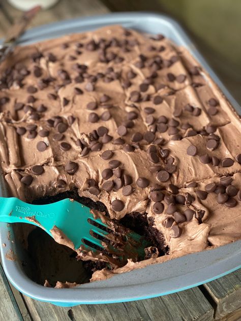 Decadent milk chocolate makes you want to deep dive into this one. Poke Cakes Condensed Milk, Milk Frosting, Chocolate Cake Mix Recipes, Cake Mix Brownies, Condensed Milk Cake, Boxed Cake Mixes Recipes, Sweet Bakes, Chocolate Poke Cake, Best Chocolate Desserts