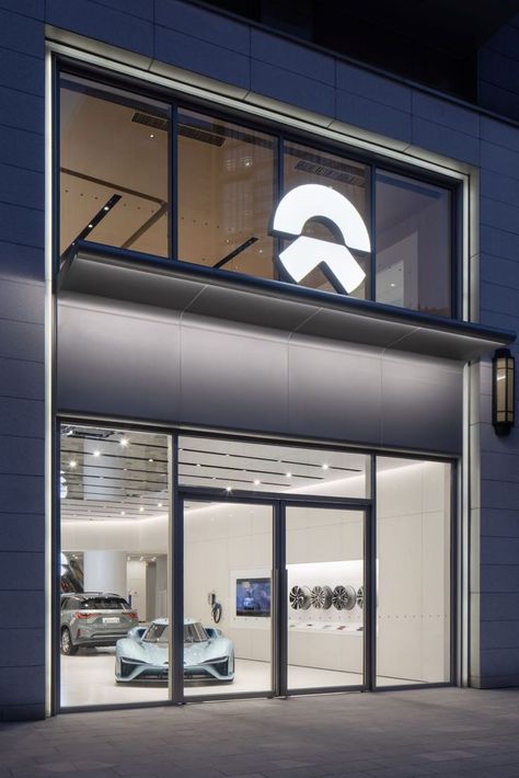 A car flagship store connecting a city to its people. Founded in 2014, NIO is an innovative electric automotive company focusing on high-performance products. It is also committed to the vision of a global user community by establishing "NIO House" around the world. After identifying a design benchmark with bigger flagships. #architecture #house #fashion #decor #diy #homedecor #amazingarchitecture #interiordesign #contemporaryhome #modern #residence #designer Car Dealership Design, Automotive Showroom, Car Showroom Interior, Stainless Steel Ceiling, Terrazzo Wall, Car Showroom Design, Furniture Store Design, Lab Ideas, Glass Door Design