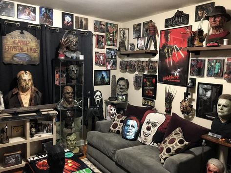 Steve Kemble Jr on Instagram: “Made a few changes to the horror room. The Badman V2 looks perfect in the 03 TCM corner. Man, i need to knock out a wall or two. Lol. I’m…” Horror Theme Living Room, Horror Fan Room, Horror Movie Living Room, Horror Living Room Ideas, Horror Inspired Room, Horror Wall Decor, Horror Movie Themed Room, Horror Collection Room, Horror Movie Bedroom Ideas