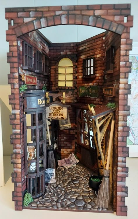 Knockturn Alley Book Nook, Harry Potter Book Nook Shelf Insert, How To Make Booknook, Diagonal Alley Book Nook, Harry Potter Nook Book, Bookshelf Book Nook, Book Nook Shelf Insert Diy Harry Potter, Harry Potter Book Nook Diy, Booknook Harry Potter