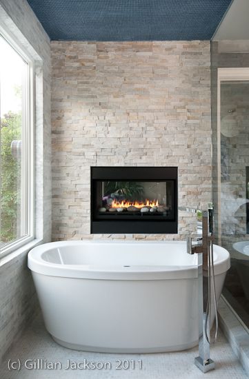 Fireplace feature wall in bathroom  built by www.halldevelopments.com Fireplace In Shower Wall, Fireplace Above Bathtub, Electric Fireplace In Master Bath, Fireplace In Bathroom Wall, Accent Wall Behind Bathtub, Fireplace Bathtub, Bathroom Fireplace Ideas, Feature Wall In Bathroom, Fireplace In Bathroom