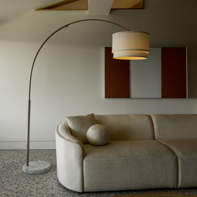 Transform any indoor space with the perfect lighting. The Brightech Sky Flux torche lamp packs a very high 2190 lumens (at 3000K warm white), enough to light a large bedroom, living room, or home office. The Sky matches modern, minimalist, urban, casual, and contemporary dÃ©cor. Measuring 10 x 63 inches the pole lamp fits easily in corners and the base slides under sofas. Its head easily pivots and shines light in any direction that you need it. With three different colour temperature options yo Hanging Floor Lamp Living Room, Over The Couch Lamp, Over Head Floor Lamp, Over Couch Lamp, Industrial Lamps Living Room, Dining Room Lamps Floor, Arch Lamp Living Room, Organic Modern Floor Lamp, Arched Lamp Living Room