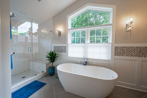 A long held dream of the homeowners was a private master bathroom that could house a free-standing soaking tub - their new addition fulfilled that dream and made it a reality. With large adjacent windows providing natural light along with soothing ambient lighting, this bathroom remodel checks every box! Master Bathrooms With Corner Tubs, Free Standing Jacuzzi Bath Tub, Bathroom Remodel Corner Tub Master Bath, Jacuzzi Tub Bathroom With Steps, Master Suite Addition, Standalone Jacuzzi Tub, Soaking Tub, Clawfoot Bathtub, Guest Bathroom