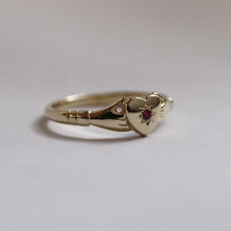 Our Amor hand ring with a ruby star setting is simply charming! Pick from black diamond, lab white diamond or ruby to enhance this classic Irish Claddagh beauty😍✨ #CladdaghRing #IrishJewelry #Handcrafted #RubyLove #CustomizeYourStyle #UniqueDesigns #GemstoneBeauty #TimelessCharm #JewelryInspiration #JadeRabbitDesign Vintage Claddagh Ring, Fairytale Engagement Rings, Irish Ring, Star Setting, Solitaire Bracelet, Jade Rabbit, Gold Claddagh Ring, Irish Ring Claddagh, Irish Claddagh