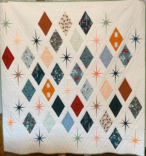 Elizabeth Cahill on Instagram: “I recently finished this quilt for my dear pal @janeereagan ! It’s the 6 month anniversary of the last day I came home from work and I’m…” Quilt Pattern Ideas, 6 Month Anniversary, Atomic Starburst Pattern, Dinosaur Quilt, International Quilt Festival, Layer Cake Quilts, Basic Quilt, Going To Sleep, Raw Edge Applique