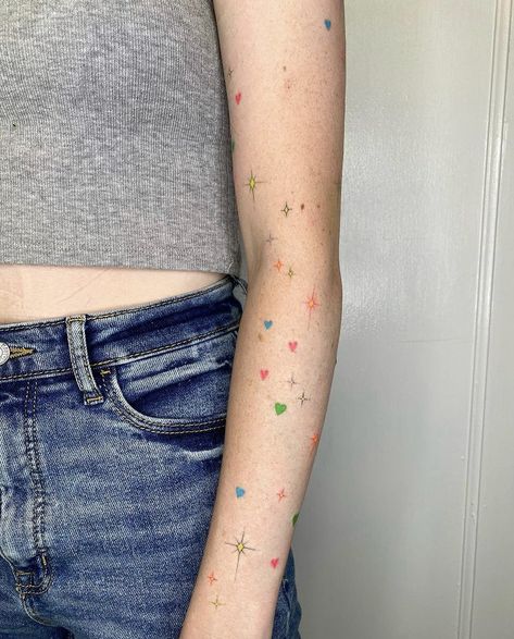 Coloured Star Tattoo, Confetti Tattoo Ideas, Colorful Stars Tattoo, Dark Disney Tattoo, Small Colorful Tattoos, Beautiful Tattoo Designs, Rainbow Tattoos, Princess Tattoo, Wicked Tattoos