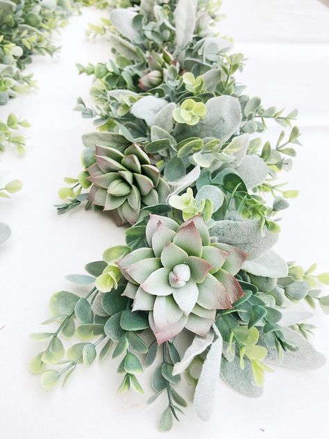 Drape this succulent garland around your wedding welcome sign or use as a table centerpiece. Mantle Greenery, Garland For Mantle, Garland Table Runner, Garland Flower, Garland Decoration, Tafel Decor, Succulent Centerpieces, Eucalyptus Garland, Greenery Garland