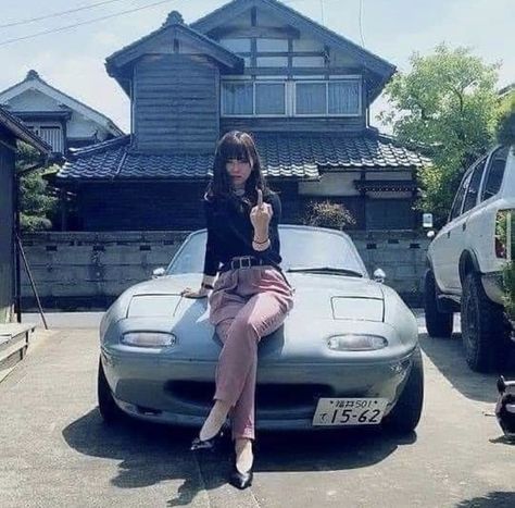 a young Japanese woman in the late 90’s early 00’s posing in front of her mazda roadster. Japan 80's Aesthetic, Japanese 90s, Jdm Girls, Mazda Roadster, Car Poses, Japanese Sports Cars, Jdm Wallpaper, Best Jdm Cars, Street Racing Cars