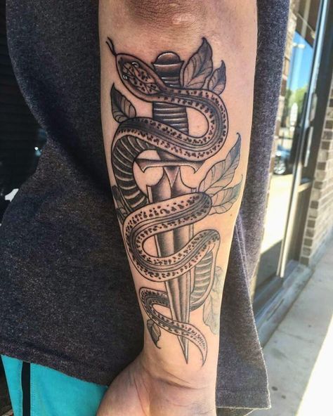 Today, tattoos have become a cool way to show off your personality or sentimentality. So if you are looking to get that awesome tattoo that is sure to make you the talk of the town, then a snake arm tattoo can be just the thing that you are looking for. #snake #tattoo #design #ideas #tattoos #snakes #arm Tattoo Designs Men Forearm, Snake Arm Tattoo, Arm Tattoo Design, Abdomen Tattoo, Around Arm Tattoo, Armband Tattoo Design, Cool Arm Tattoos, Awesome Tattoo, Snake Tattoo Design