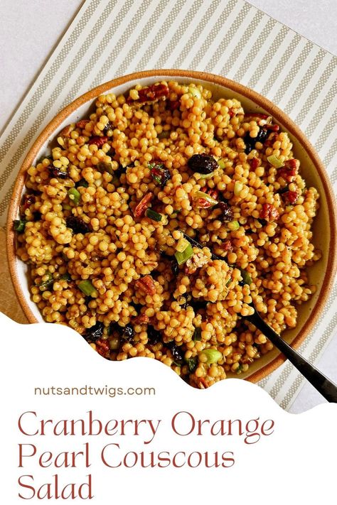 top view of a bowl of the salad with a fork in it. Cranberry Orange Couscous Salad, Orange Couscous Salad, Delicious Couscous Recipes, Cranberry Couscous Salad, Winter Couscous Salad, Thanksgiving Couscous, Fall Couscous Salad, Room Temperature Potluck Dishes, Winter Couscous