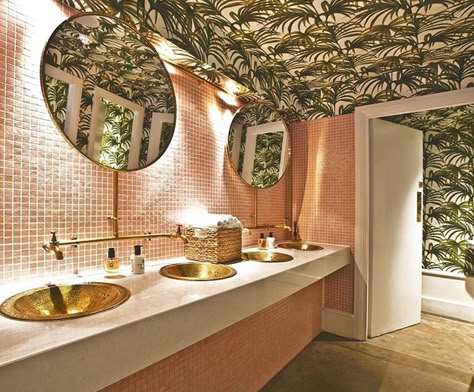 Another design haven is Restaurant Ours, where its bathroom steals the show. Palm trees that cover wall-to-ceiling and complementary baby pink tiles make a trip to the loo feel like you've been transported to Beverly Hills. Toilette Design, Restaurant Bathroom, Tropical Bathroom, Restroom Design, Bad Inspiration, Toilet Design, Pink Bathroom, Bathroom Wallpaper, Small Bathroom Decor