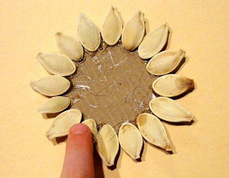 Before you toss those gooey pumpkin seeds, consider making these cute crafts instead Diy Pumpkin Seeds, Seed Crafts For Kids, Pumpkin Seed Crafts, Seed Craft, Flower Vase Crafts, Crafts Cute, Elegant Pumpkins, Seed Art, Fall Decor Diy Crafts