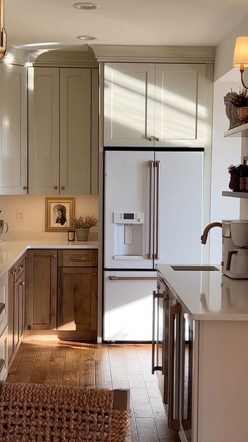 Jade Lundgren on Instagram: "Having a prep kitchen area has been great for both the mess we can make that is less visible, but also for what the wall adds as far as both cabinet and counter space. When we originally designed the kitchen, my hope was for a big, open layout. When we realized that one of our walls was a support wall (and learned the cost of removing it 😬) we reworked the entire plan around dividing the kitchen with the wall. The disappointment was a huge blessing in disguise as we Kitchen With Cutout Wall To Living Room, Fridge Next To Corner Cabinet, Kitchen With Cased Opening, Kitchen With Doorway In Middle, Area Above Refrigerator, Fridge Against Wall In Corner, Where To Put Refrigerator In Kitchen, Door In Kitchen To Outside, Fridge Against Wall