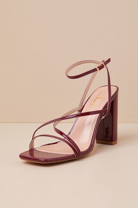 The Lulus Makennaa Oxblood Patent Strappy High Heel Ankle Strap Sandals are the perfect finishing touch to any flirty going-out look! These sleek heels have a shiny faux patent leather construction that shapes a square toe bed, a slender toe strap, and matching vamp straps that create a crisscrossing effect. An adjustable ankle strap sprouts from the sides and secures with a shiny gold buckle, all atop a chic block heel. 3. 75" wrapped block heel. Cushioned insole. Rubber sole has nonskid markin Heels For Burgundy Dress, 90s Strappy Heels, 90s Prom Shoes, Heels Wedding Guest, Dark Red Heels, Bridesmaid Heels, Wedding Guest Heels, Date Night Shoes, Homecoming Heels