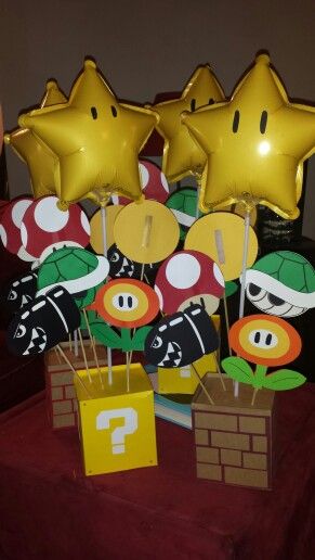 Super Mario Party Table Ideas, Mario Brother Centerpieces, Diy Mario Centerpieces, Princess Peach Birthday Party Centerpiece, Mario Party Centerpieces Ideas, Mario Brothers Centerpieces, Mario Kart Centerpiece Party Ideas, Mario Mushroom Diy, Mario Table Centerpiece