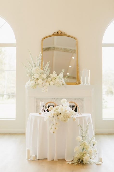 Wedding sweetheart table of your ✨dreams ✨ We LOVE this table for two in front of our cozy fireplace. #WeddingSweetheartTable #DreamWedding #CozyFireplace #IntimateWedding #RomanticSetting #WeddingInspiration #WeddingVibes #WeddingDecor #WeddingIdeas #WeddingGoals Photo by Carissa Marie Photography Unique Sweatheart Table, Sweetheart Table With Fireplace, Sweetheart Table Fireplace, Minimal Sweetheart Table Wedding, Sweetheart Table Wedding Fireplace, Unique Sweetheart Table Ideas, Sweetheart Table Round, Sweetheart Table Wedding Elegant, Sweetheart Table Wedding Flowers