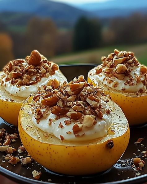 Baked Pears with Cream Cheese and Walnut Topping Ingredients: 4 ripe pears, halved and cored 🍐 1 cup cream cheese, softened 🧀 1/2 cup walnuts, finely chopped 🌰 1/4 cup brown sugar 🍬 1/4 cup honey or maple syrup 🍯 1 tsp vanilla extract 🌼 1/2 tsp ground cinnamon 🧂 1/4 tsp nutmeg (optional) 🌰 Fresh mint leaves (for garnish, optional) 🌿 📝 Instructions: Preheat your oven to 350°F (175°C) and line a baking dish with parchment paper. Arrange the pear halves in the baking dish, cut side up. In a m... Walnut Topping, Ripe Pears, Baked Pears, Fresh Mint Leaves, Baking Dish, Mint Leaves, Fresh Mint, Ground Cinnamon, Parchment Paper