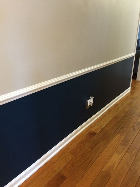 Navy blue and gray hallway Blue And Grey Hallway, Half Navy Half White Walls, Navy Blue Chair Rail, Dark Blue And White Hallway, Blue Accent Wall Hallway, Navy Blue Half Wall, Navy Half Wall, Navy Blue Hallway Ideas, Half Painted Wall Office