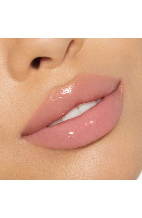 What it is: A lip gloss that offers multidimensional shine and color.What it does: It glides on easily and leaves lips looking luminous and glossy without any stickiness. How to use: Apply directly onto your lips. Wear alone or over lipstick. 0.11 oz. Paraben-free; sulfate-free; gluten-free Cruelty-free Vegan Made in the USA Soft Pink Lipstick Makeup, Wedding Lip Combo, Light Pink Lip Combo, Kylie High Gloss, Kylie Lip Shine Lacquer, Ingenue Archetype, Light Pink Gloss, Lip Gloss Kylie, Lips Looks