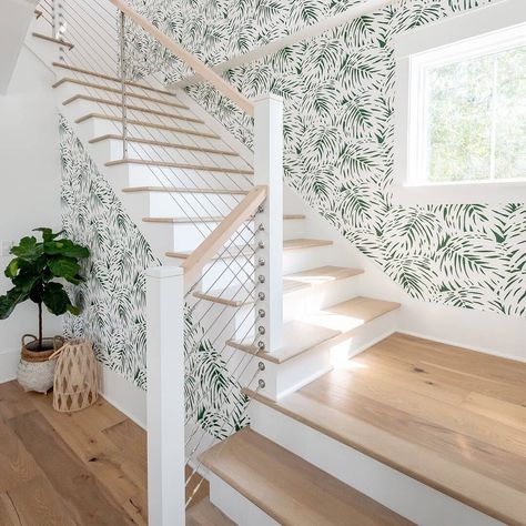 Serena & Lily on Instagram: “A fresh twist on an iconic look. Our designers turned up the drama for a vibe that’s bold and dynamic. We love how @delpinocustom brought…” Modern Stair Railing, Stair Railing Design, Palm Wallpaper, Stair Case, Modern Stairs, Interior Stairs, Railing Design, House Stairs, Serena & Lily