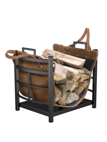 Hauling wood from the shed to the house is now simpler than ever. The removable leather tote attaches to a powder-coated metal stand that remains fireside. Indoor Firewood Rack, Firewood Storage Indoor, Firewood Carrier, Firewood Racks, Wood Storage Rack, Log Carrier, Log Home Interiors, Log Home Plans, Firewood Logs