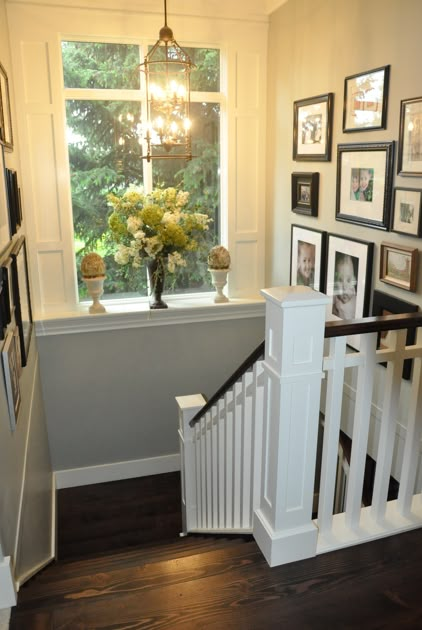 love the dark wood. the white railing. the landing. the photo collage. stairwell perfection. Window Lighting, Stairs Railing, In This House, Styl Boho, Style At Home, Home Fashion, Railing, House Inspiration, My Dream Home