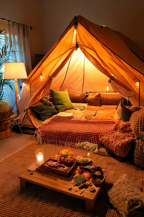 Looking for unique at-home date ideas? Try indoor camping! We've compiled a list of romantic ideas to transform your living room into a dreamy campsite. Click for our top picks of date night games and activities to keep the spark alive. Camping Inside The House, Camp Date Night Romantic, Romantic Night In Ideas, Camping Indoors Kids, Couples Night In, Couples Date Night Aesthetic At Home, Date Night Home Ideas, Room For Couples Ideas, Cute Date Setups