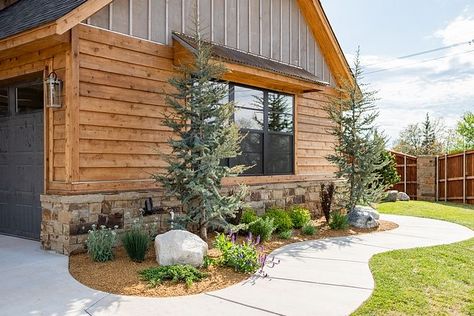 The home exterior features gray stained board and batten, Cedar siding and reclaimed barnwood That's how a real farmhouse is made of! #homeexterior #stainedboardandbatten #Cedarsiding #reclaimedbarnwood Exterior Wood Siding Colors, Exterior Siding Ideas, Rustic Cabin Exterior, Log Homes Exterior, Mid Century Modern Farmhouse, Wood Siding Exterior, Siding Ideas, Homes Exterior, Cabin Exterior