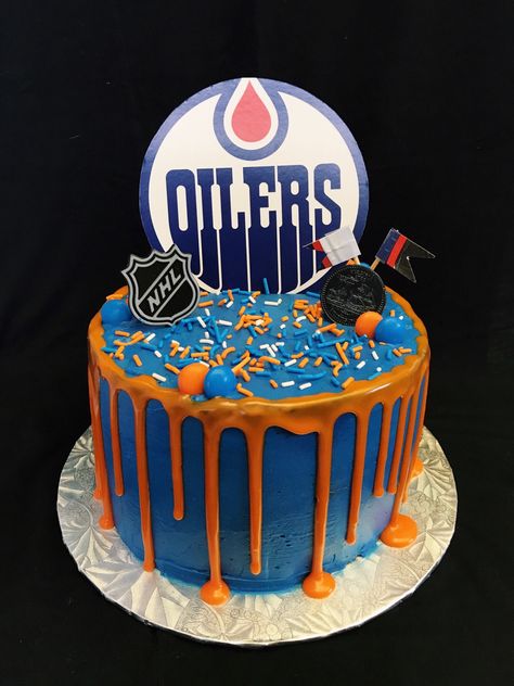 Oilers drip cake inspired Edmonton Oilers Cake Birthday, Oilers Birthday Party Ideas, Hockey Cake Ideas Birthdays, Edmonton Oilers Cake, Oilers Cake Birthdays, Oilers Cupcakes, Oilers Birthday Party, Hockey Themed Cake, Ice Hockey Cake