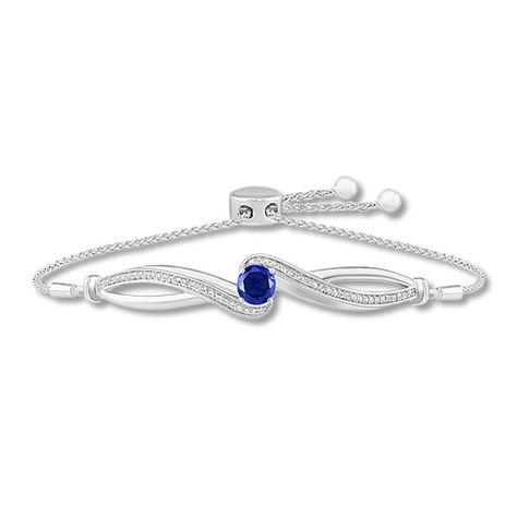 Sweet and on-trend chic, this shimmering bolo bracelet is a must-have accessory. The infinity-inspired center features a brilliant round-cut blue lab-created sapphire amidst sweeps of glittering white lab-created sapphires. Styled in sterling silver, the adjustable wheat chain secures with a bolo clasp. Bolo Bracelet, White Lab, Rose Ring, Sterling Silver Bracelets, Sapphire Ring, Round Cut, Wheat, Apparel Accessories, Jewelry Bracelets